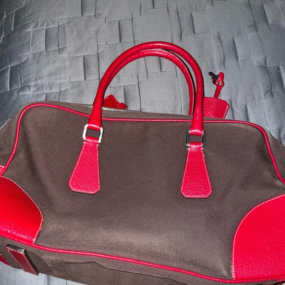Prada Handbags - Prada bag. New without tags 13.78 width Depth 5.1
9.4 height
